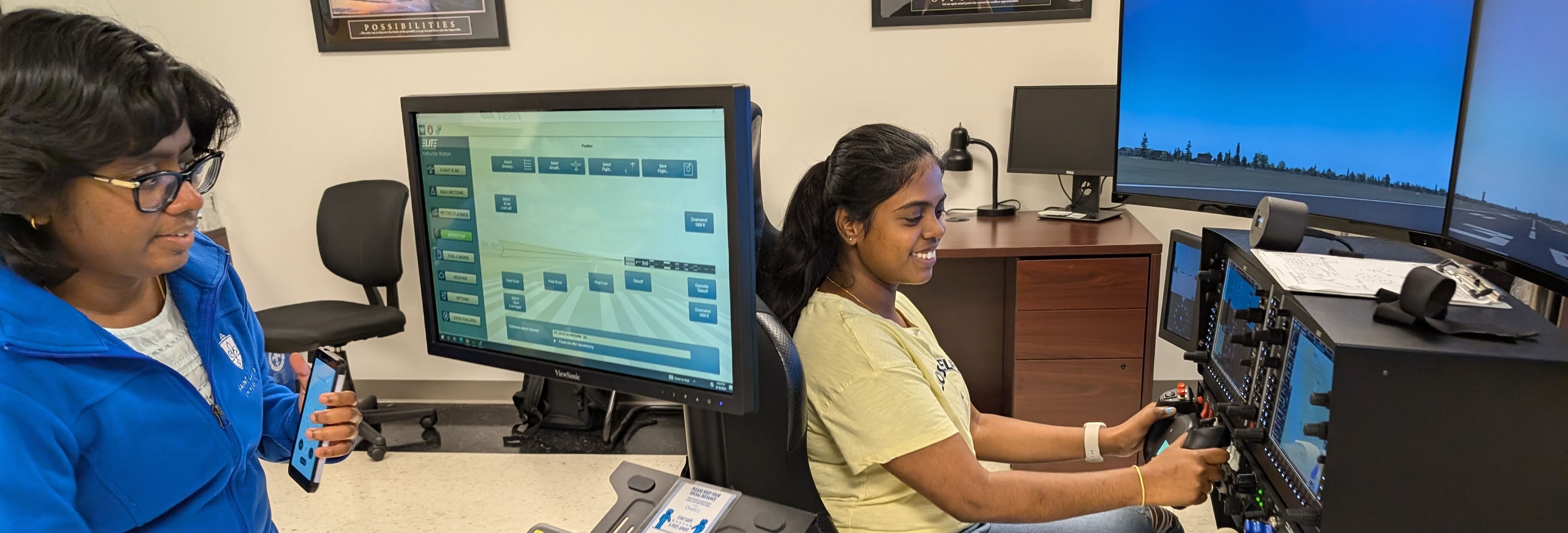 Tech Lead Harshitha Thota collaborates with Dr. Gajapriya Tamilselvan in the flight simulation lab, demonstrating our hands-on approach to complex research challenges.